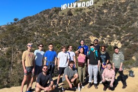 Duke in LA students in front of the Hollywood sign